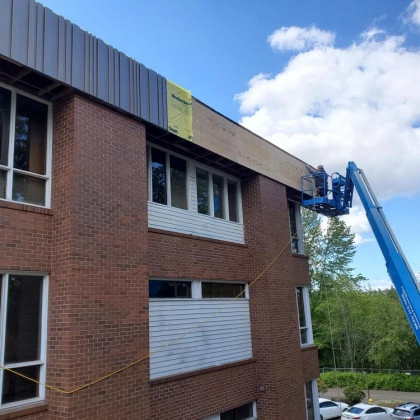 Window replacement project on brick building